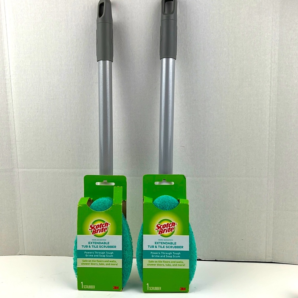 Two extendable tub and tile scrubbers. One for each bath, or one and a spare